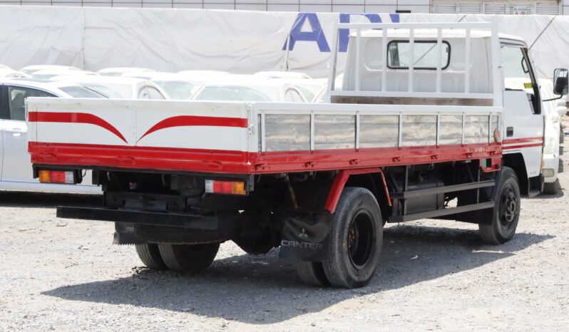 
								Toyota Canter white Red full									