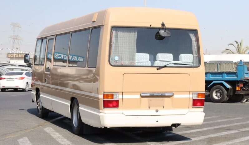 
								Toyota Coaster Passenger Bus full									