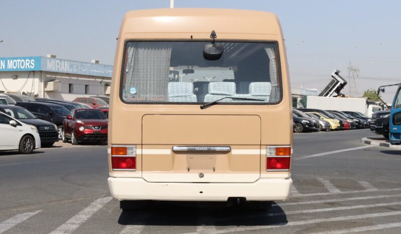 
								Toyota Coaster Passenger Bus full									