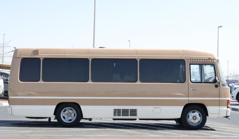 
								Toyota Coaster Passenger Bus full									