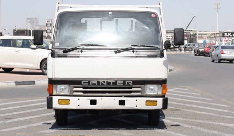 
								Mitsubishi Canter white Tempo full									