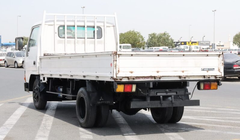 
								Mitsubishi Canter White Flatbed Truck full									