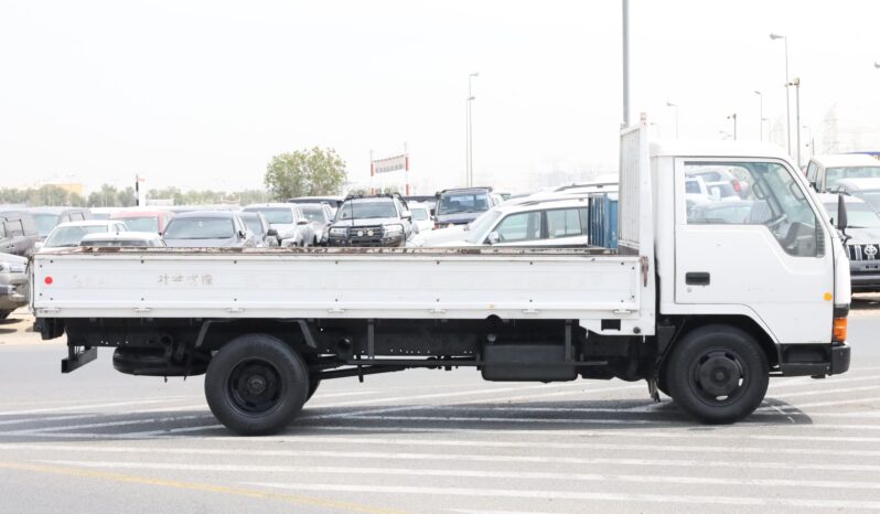 
								Mitsubishi Canter White Flatbed Truck full									