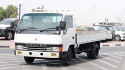 
										Mitsubishi Canter White Flatbed Truck full									