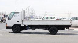 
										Mitsubishi Canter White Flatbed Truck full									