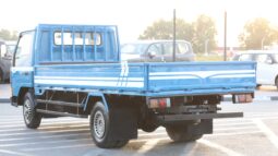 
										Mitsubishi Canter 2.0 Blue Flatbed Truck full									