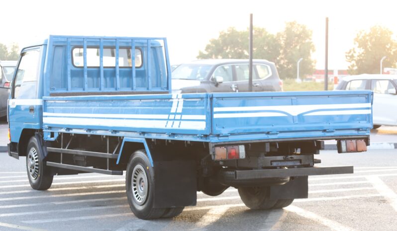 
								Mitsubishi Canter 2.0 Blue Flatbed Truck full									