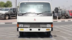 
										Mitsubishi Canter white long Truck full									
